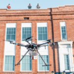 Drone Inspecting Building